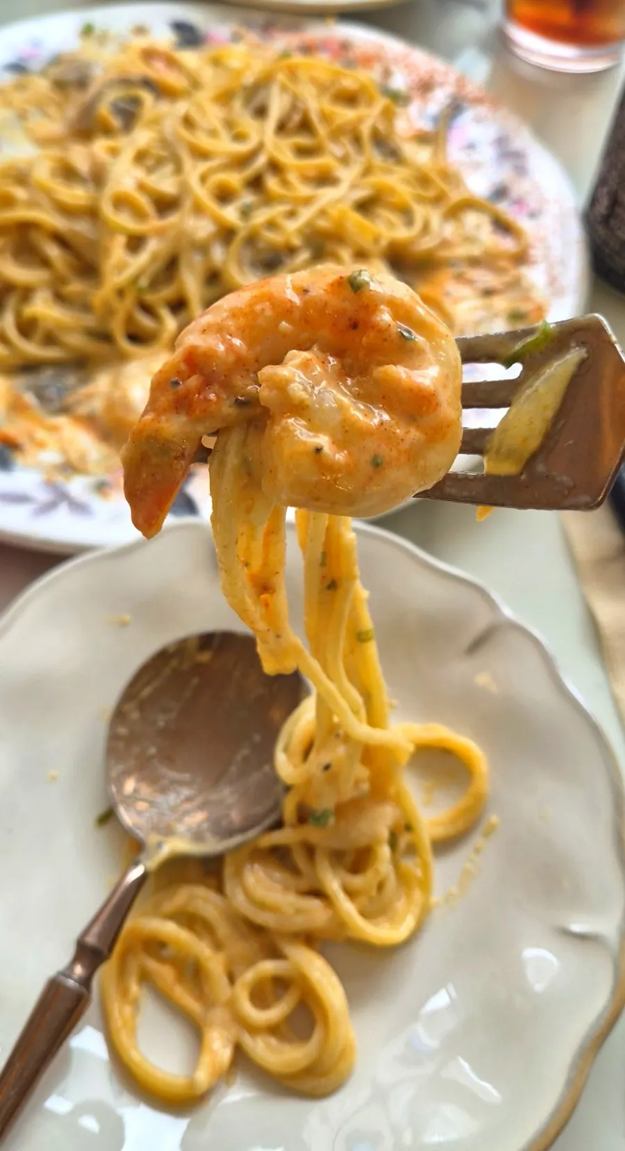 Spicy cream pasta topped with egg yolk
