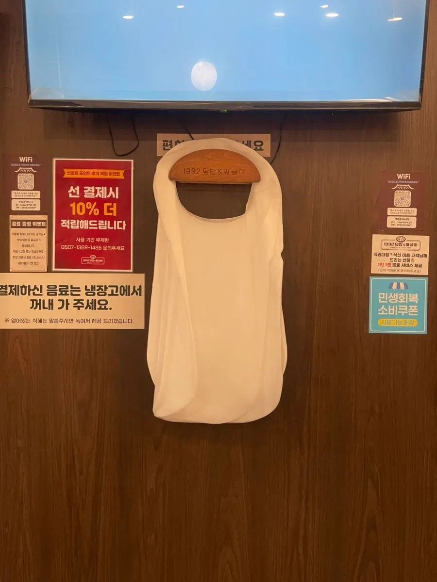 Self-serve bar with water dispenser, wet wipes, and mouthwash