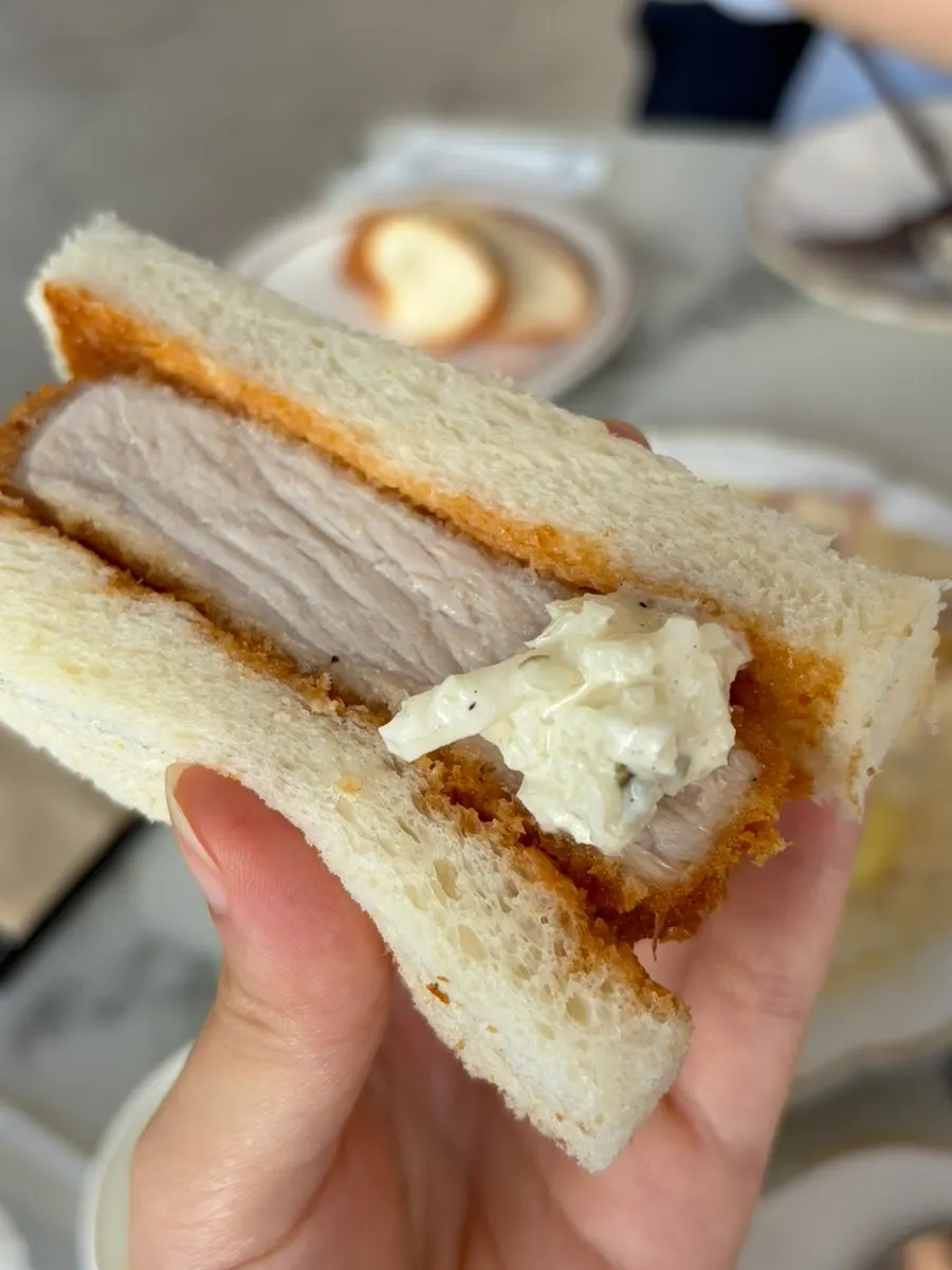 Cross-section of the katsu sando with thick pork loin cutlet