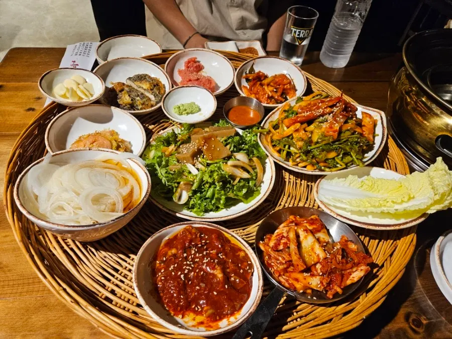 Full spread of side dishes at the BBQ restaurant