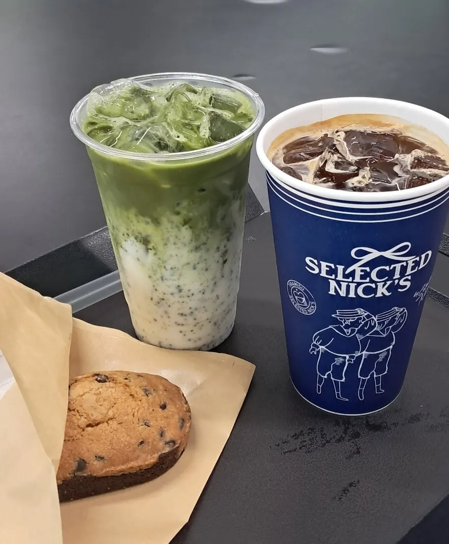 Matcha latte and iced americano in personal takeout cups