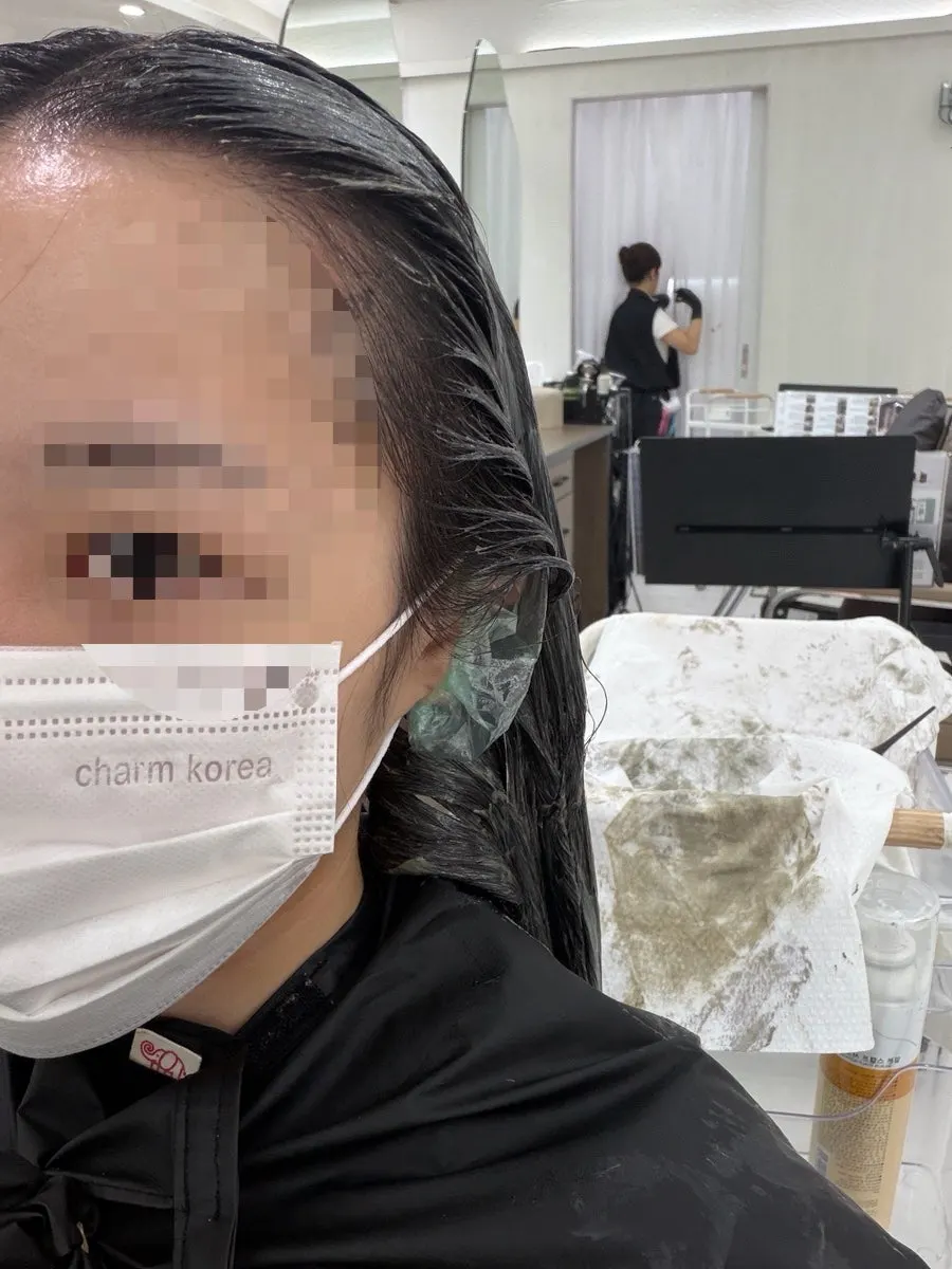 Hair sectioned and coated with dye