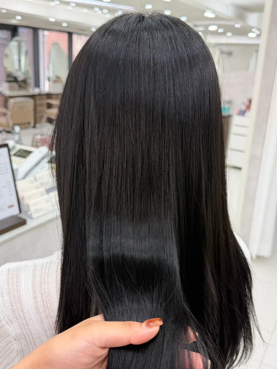 Back of hair showing shine and neat texture after dyeing