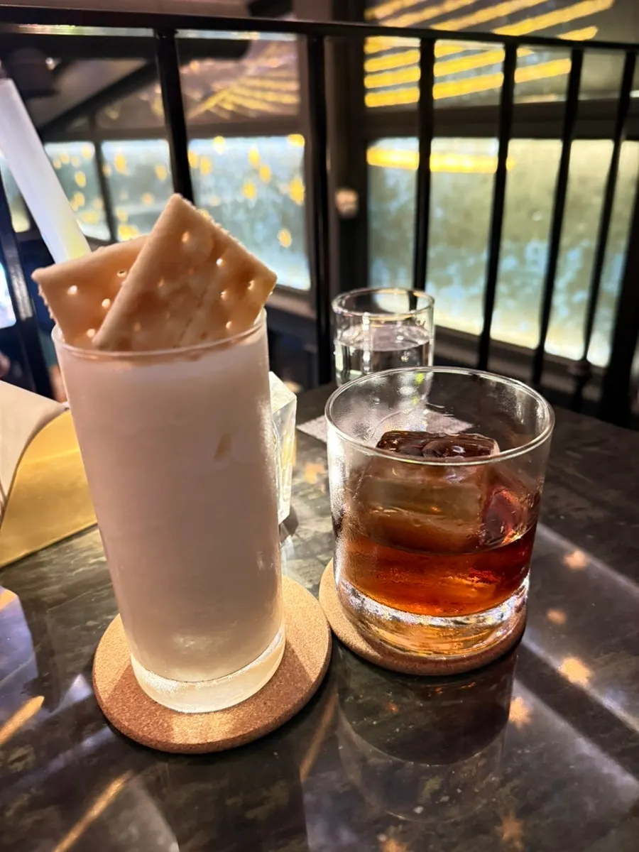 Piña Colada and Black Russian on the table