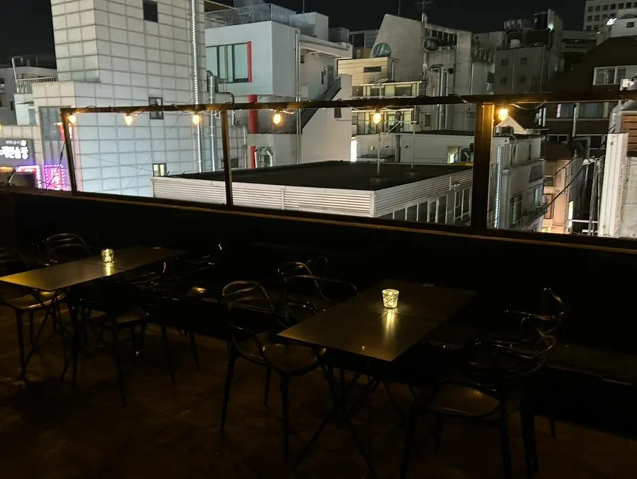 Outdoor terrace seating at Ugly