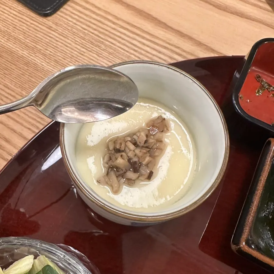 Steamed egg topped with mushrooms