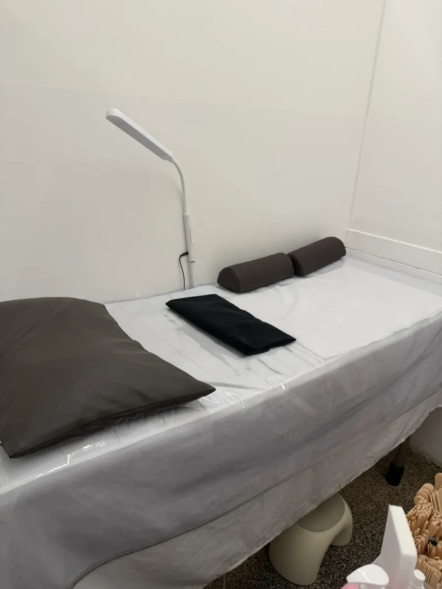 Interior of a waxing room separated by partition walls