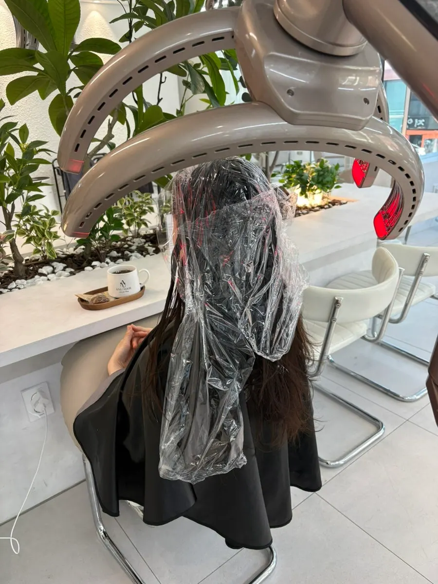 Hair before the dye, showing the split two-tone color