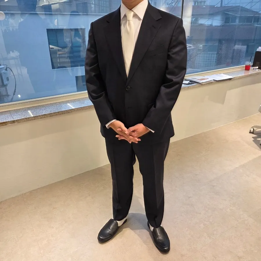 Groom's wedding suit basted fitting