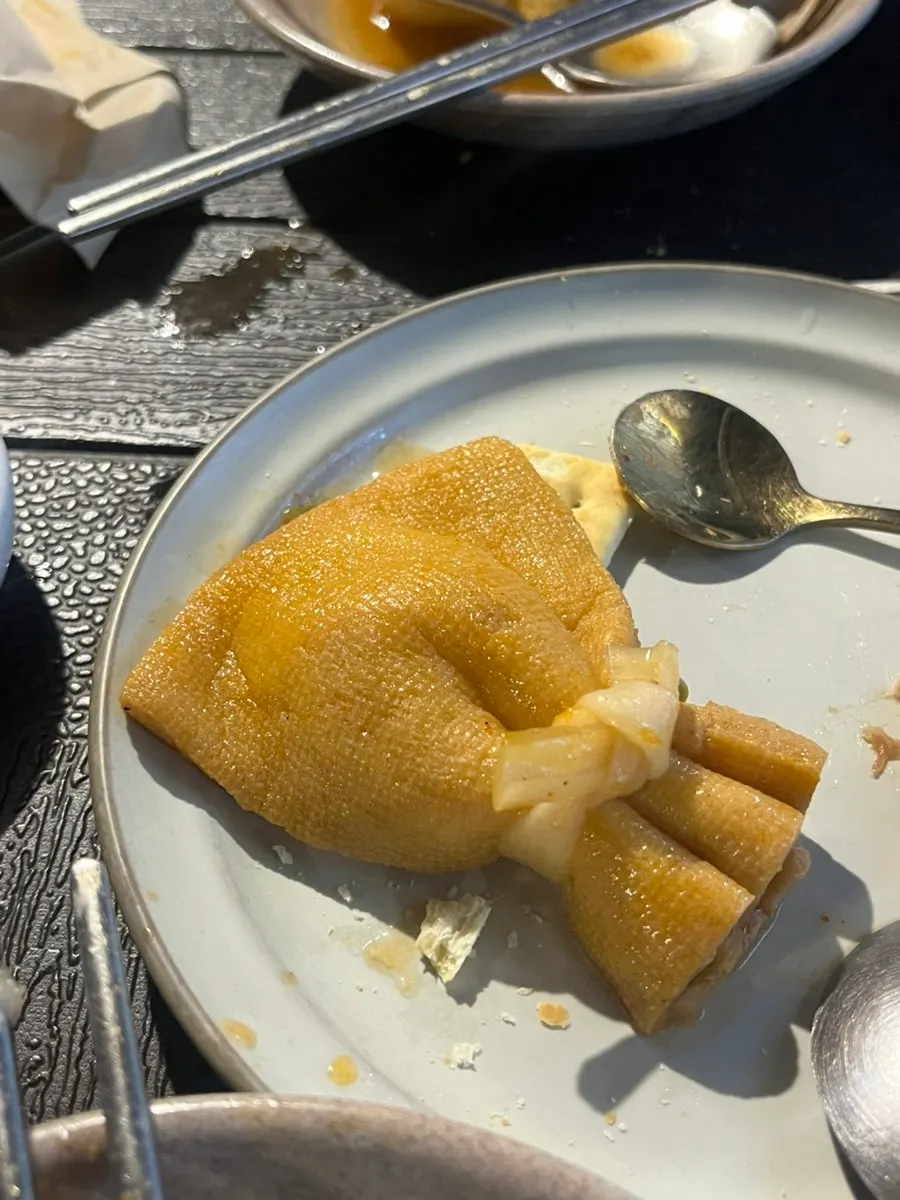 Yubu (fried tofu) pocket in the oden soup