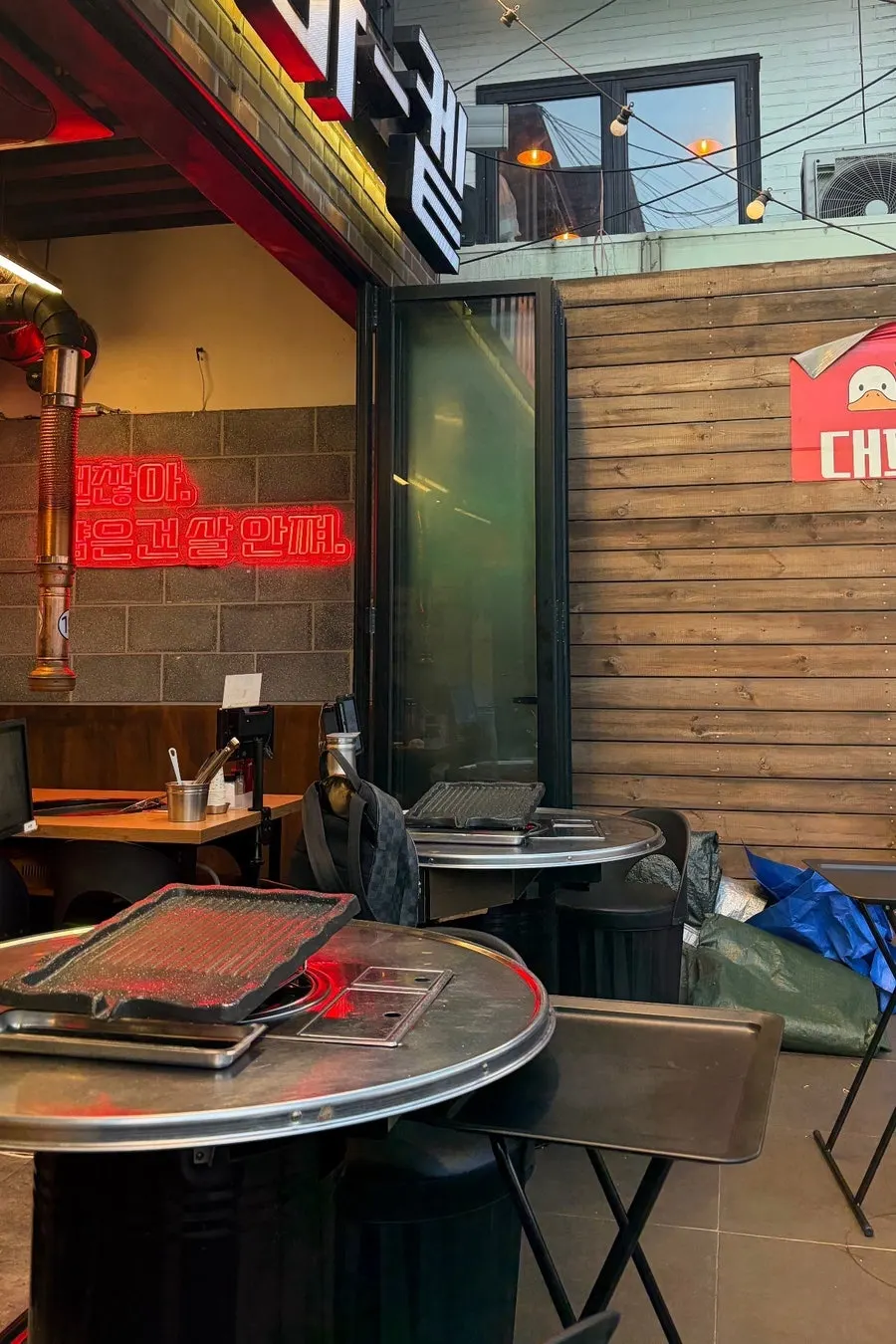 Grill and basic table setup for outdoor seating
