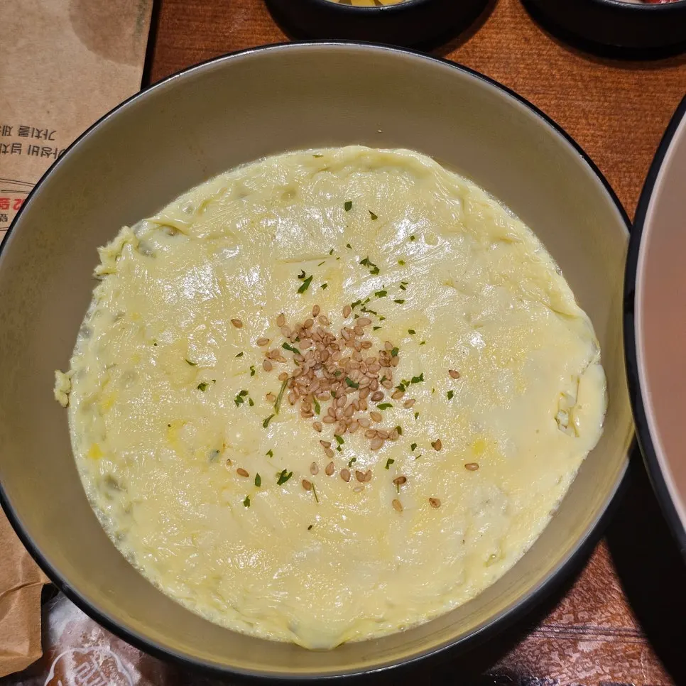 Steamed egg served in a large bowl