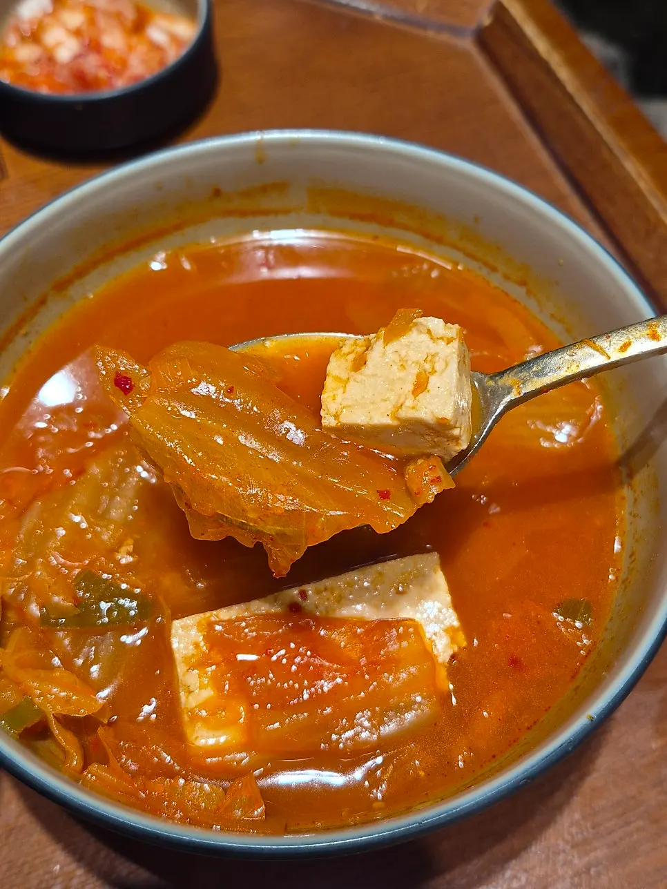 Well-fermented kimchi and large chunks of tofu in the jjigae