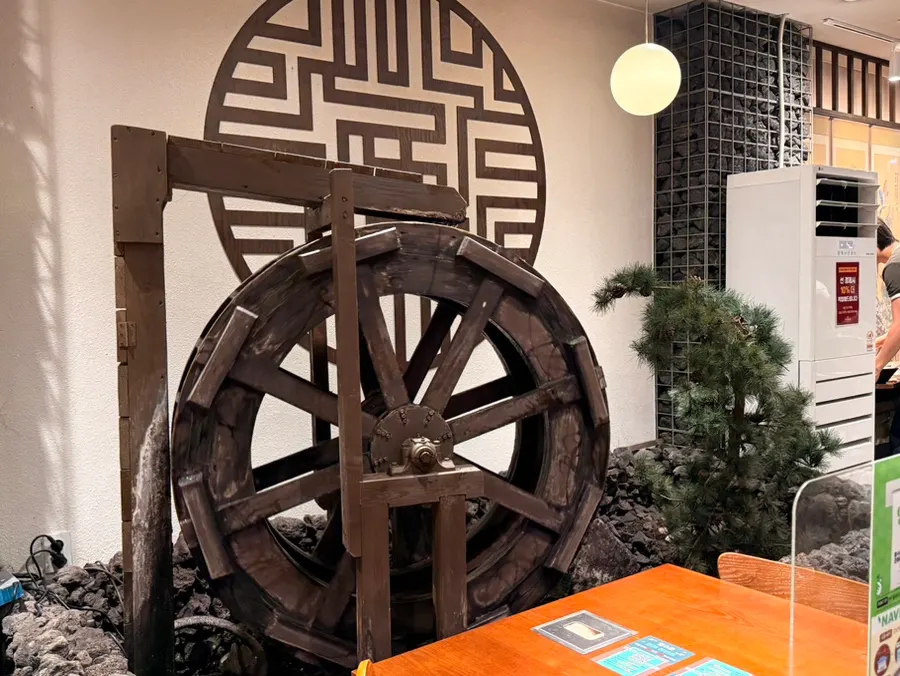 Solo bar seating and regular tables at the Korean restaurant