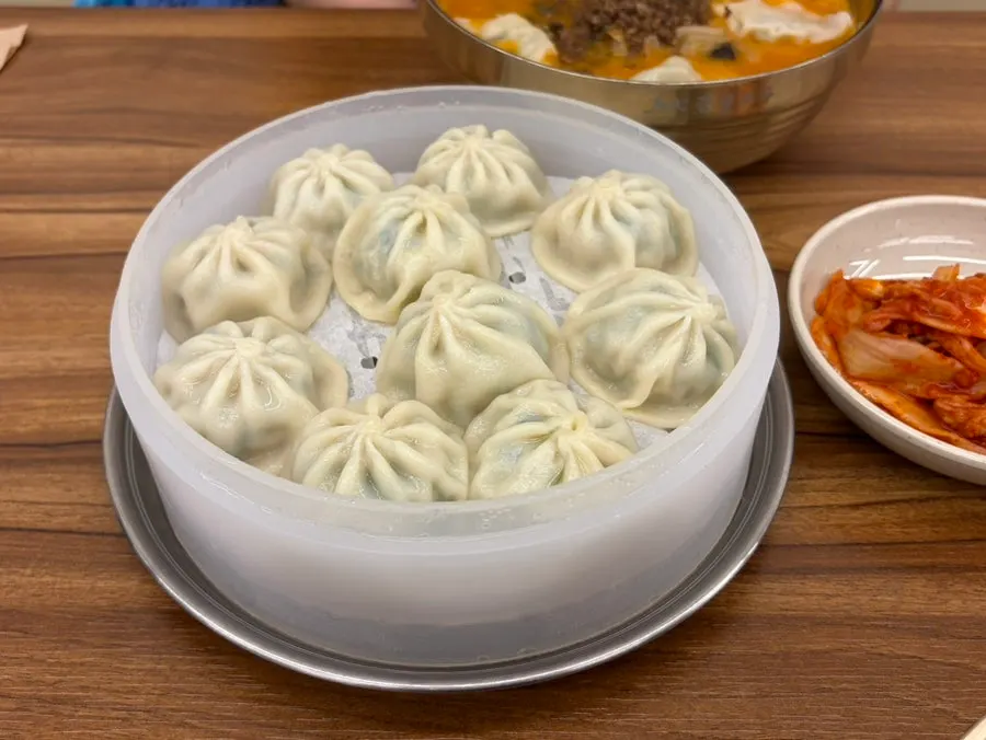 Plate of juicy gyoza dumplings