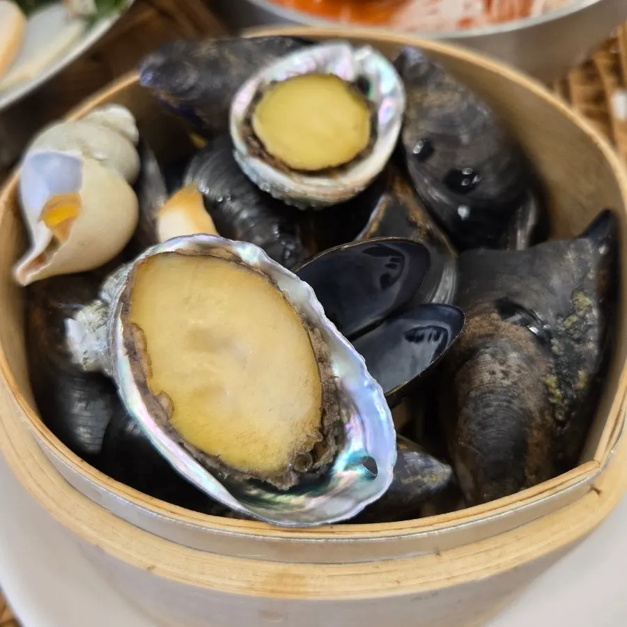 Side dish plates served with the haenyeo table