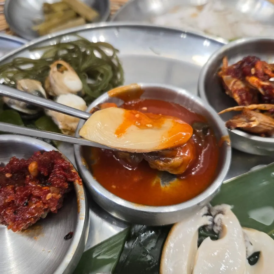 Plate of warm steamed abalone and whelk