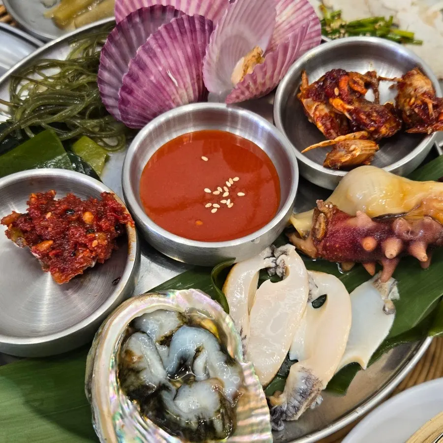 Full breakfast table spread at Gangneung Jeonbok Haenyeo Village
