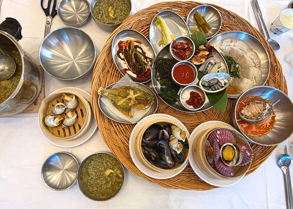 Full spread of abalone porridge and the haenyeo table