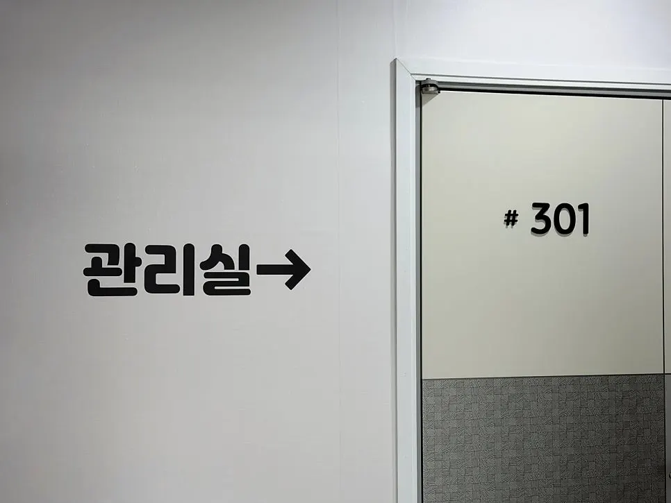 The sea-facing floor-to-ceiling window visible upon opening the door of Room 402