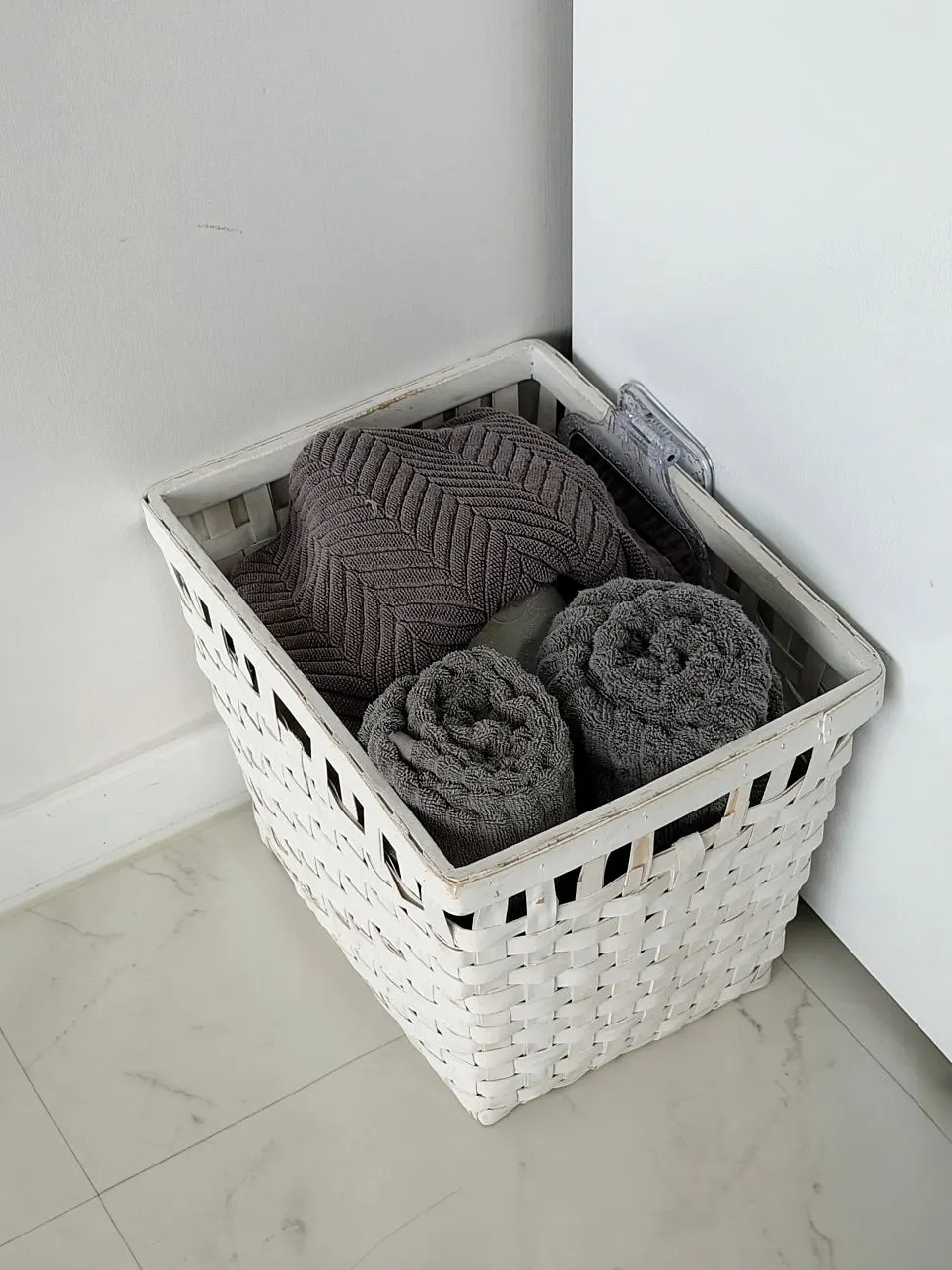 Bathroom space with spare towels laid out