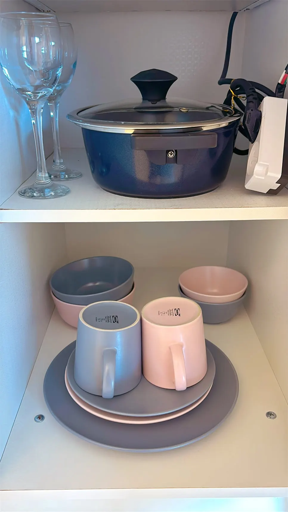 Matching set of cups, plates, and bowls provided in the room