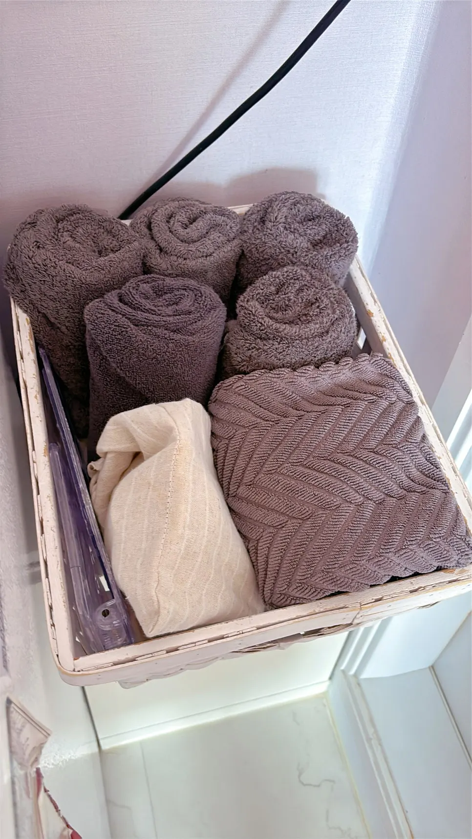 Towels set out in front of the bathroom