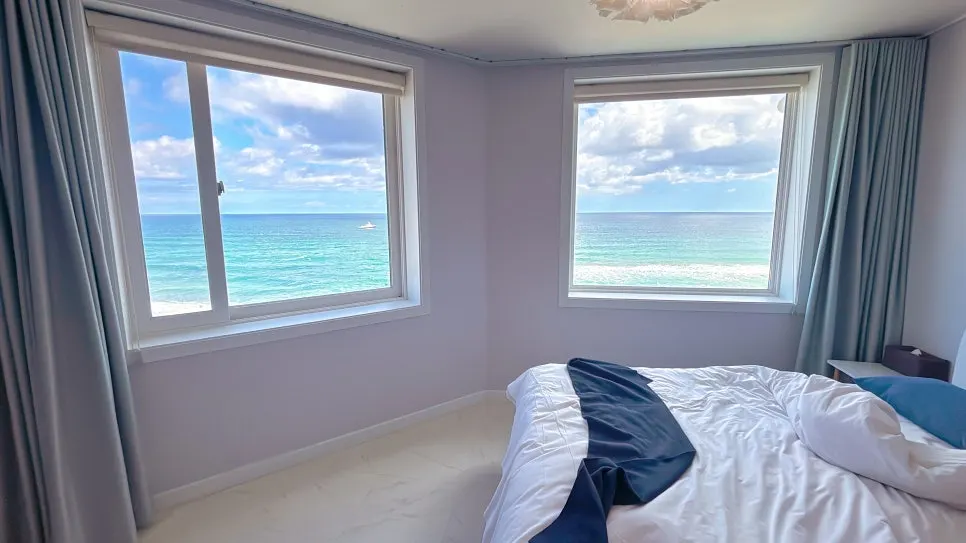 Full ocean view of Anmok Beach spread across room 504's window