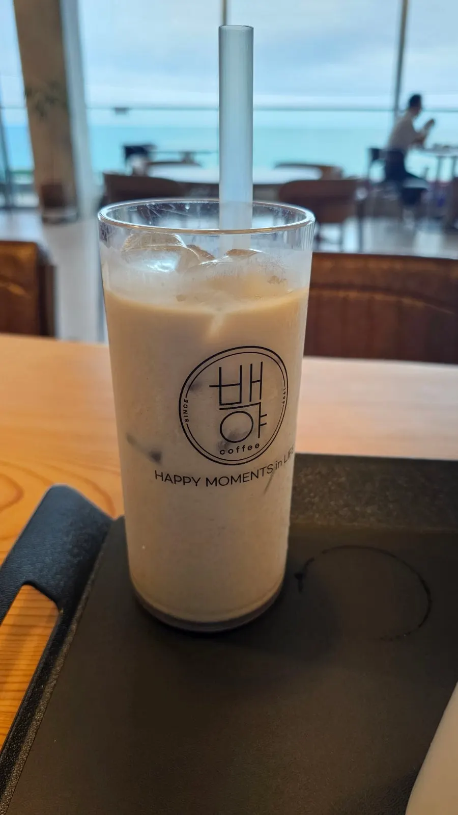 A cup of Baegya Coffee's 7-grain misugaru latte