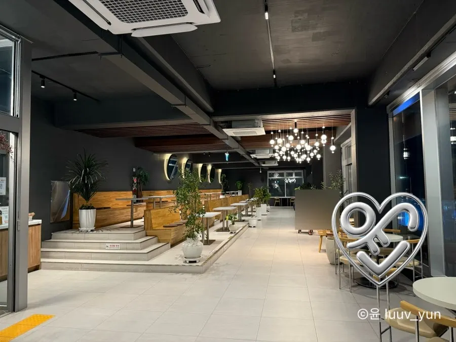 Interior hallway with elevator at Baegya Coffee