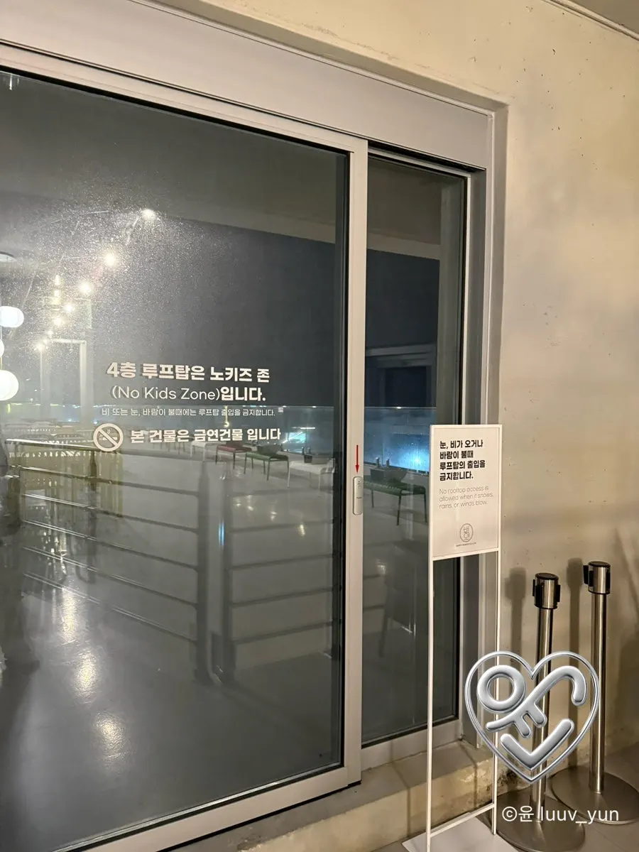 Bright interior of Baegya Coffee's 3rd floor with full-length windows