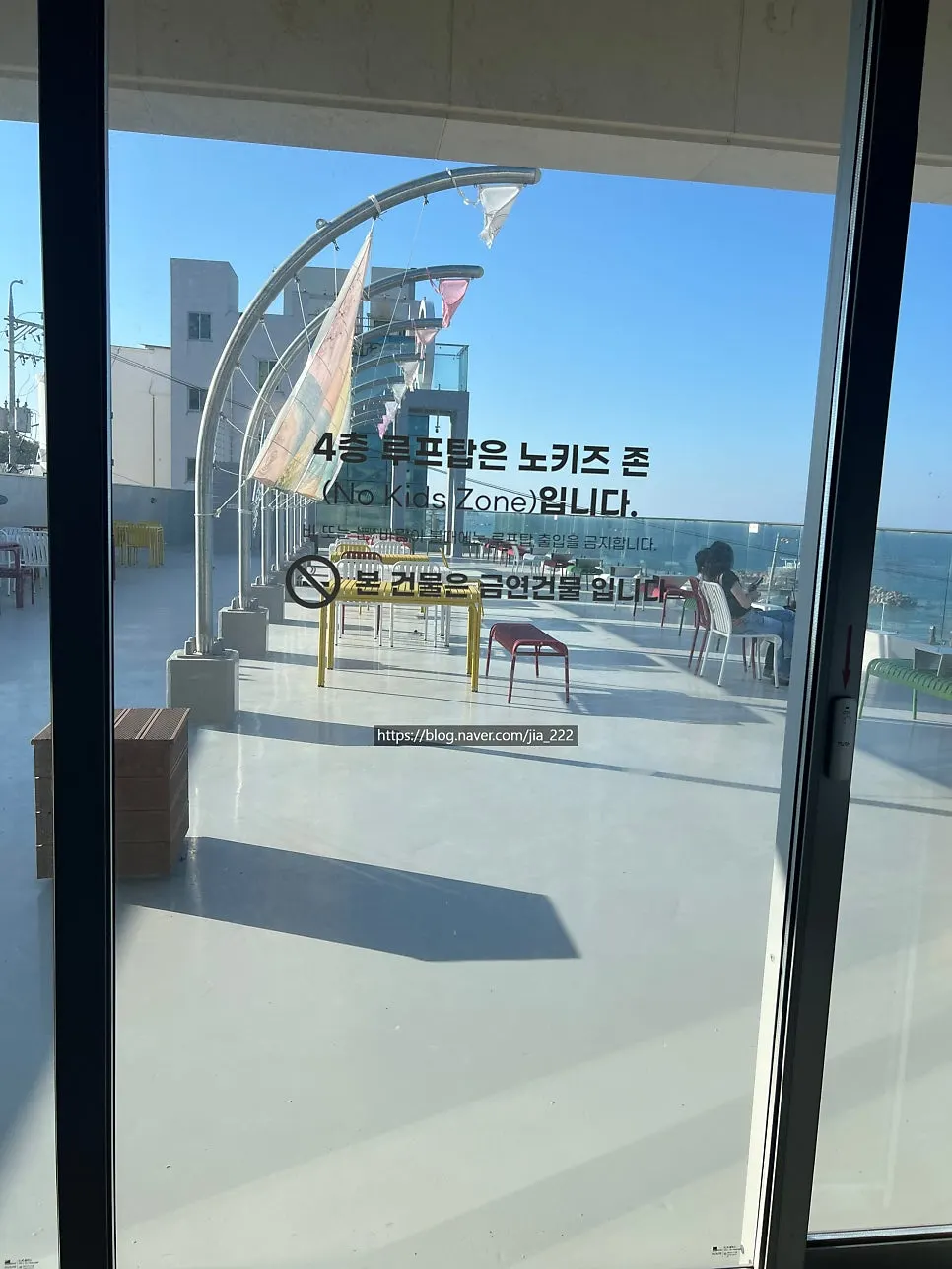 Door leading to the 4th-floor rooftop and outdoor seating