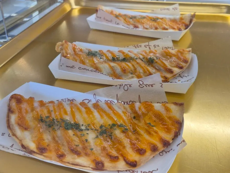 Rows of bread lined up at the Baegya Coffee bakery counter