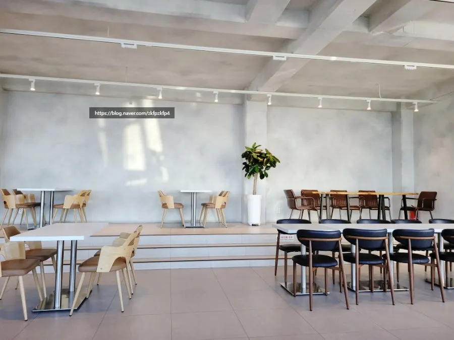 Wide-spaced interior seating at Baegya Coffee