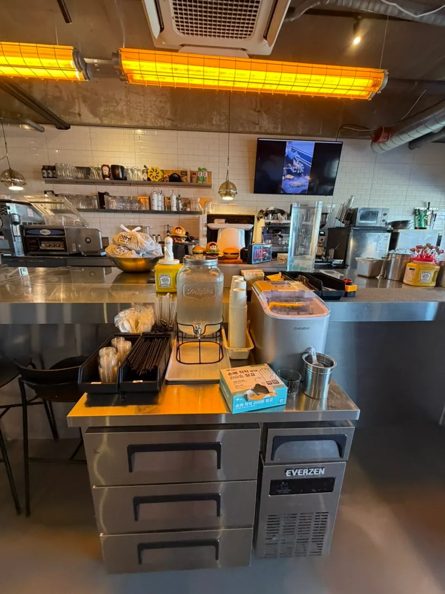 Interior view showing Burger Bar's open kitchen