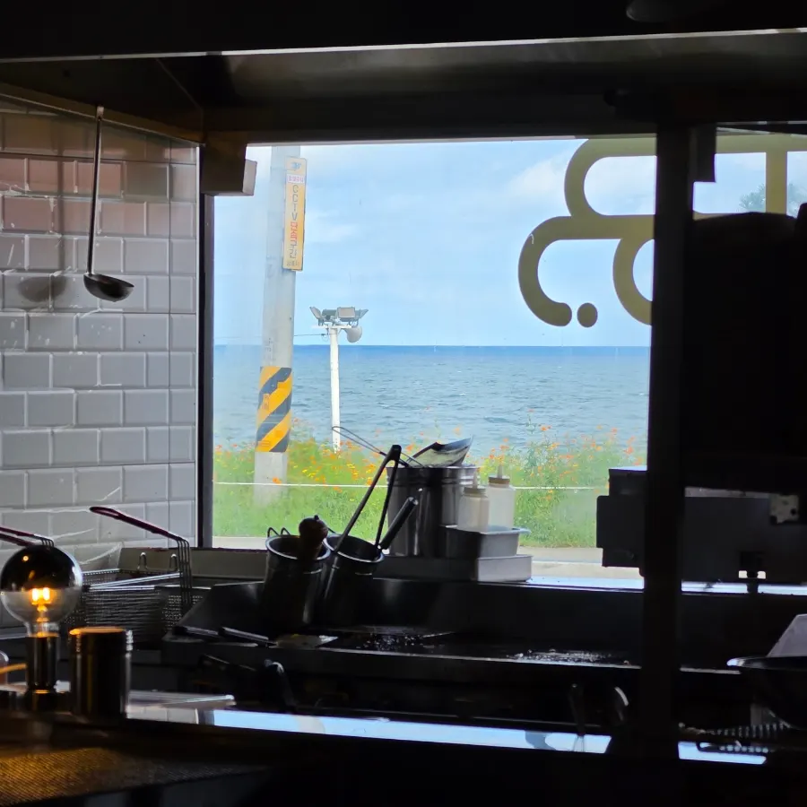 View of Sageunjin Beach seen from inside Burger Bar