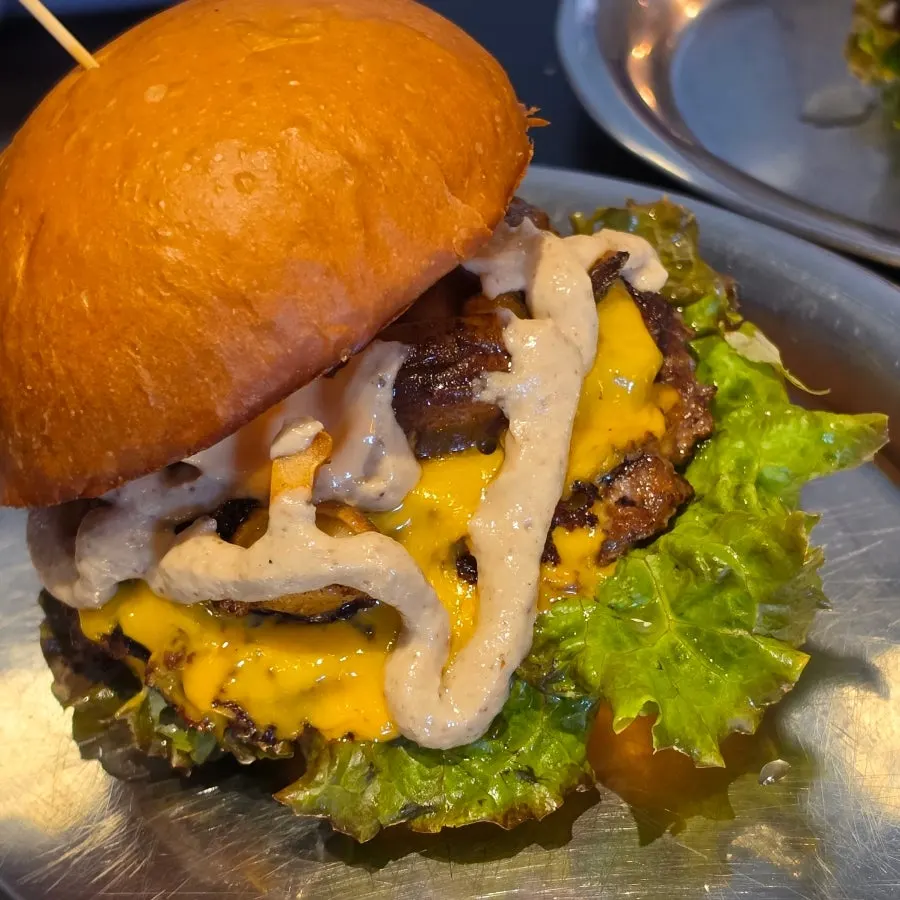 Cross-section of the Daegwallyeong Songgo Mushroom Burger, packed full inside
