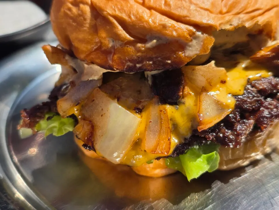 Cross-section of the burger showing lobster meat