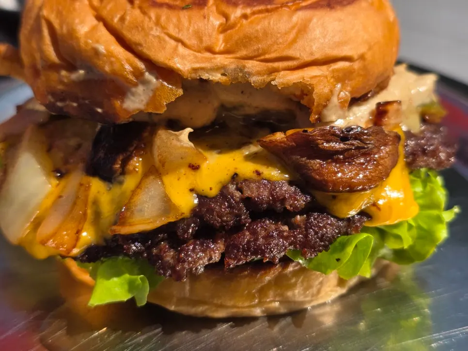 Daegwallyeong songgo mushroom burger cut in half