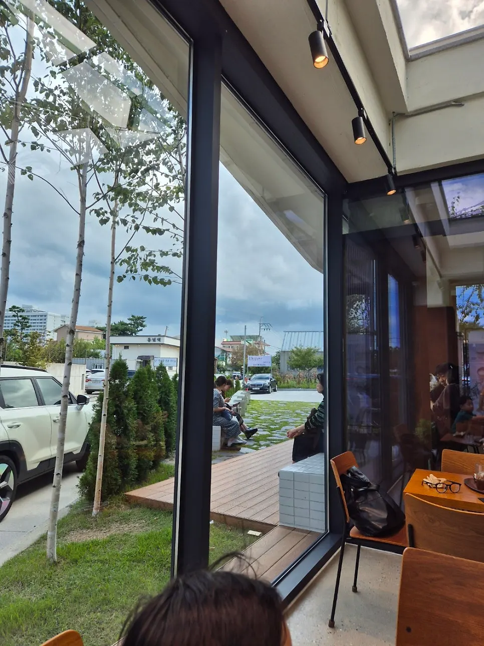 Long bar table seating by the window