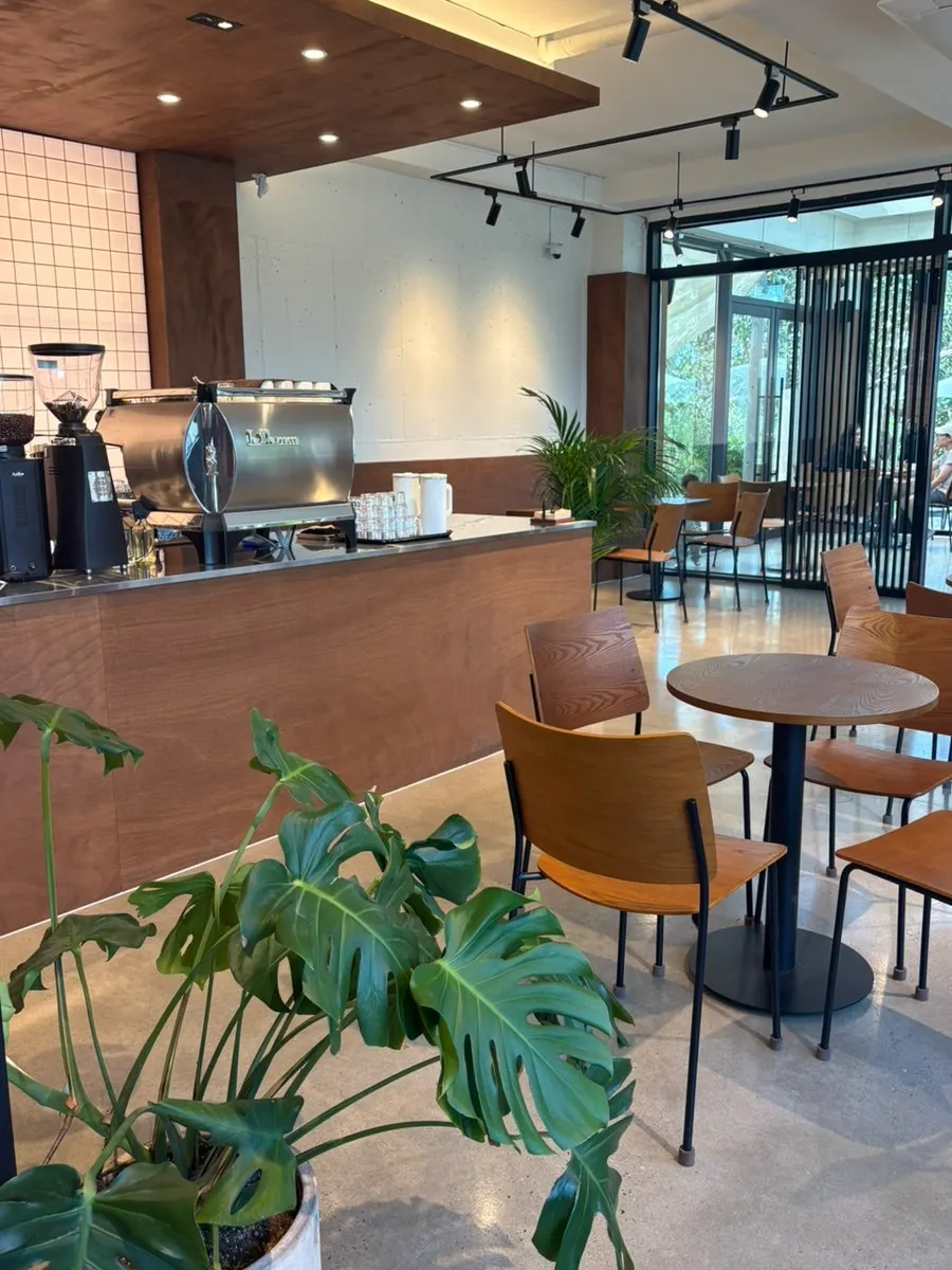Wood-toned indoor seating at Coffee Dripper