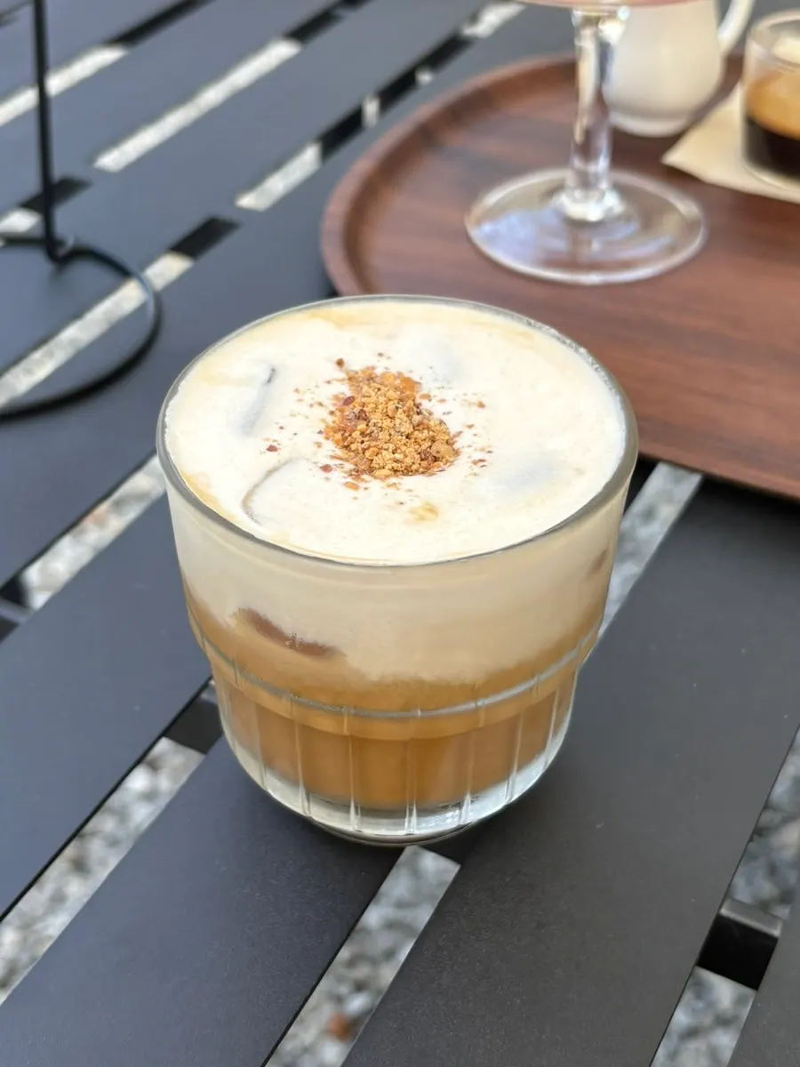 Holding Coffee Dripper's cone choco latte