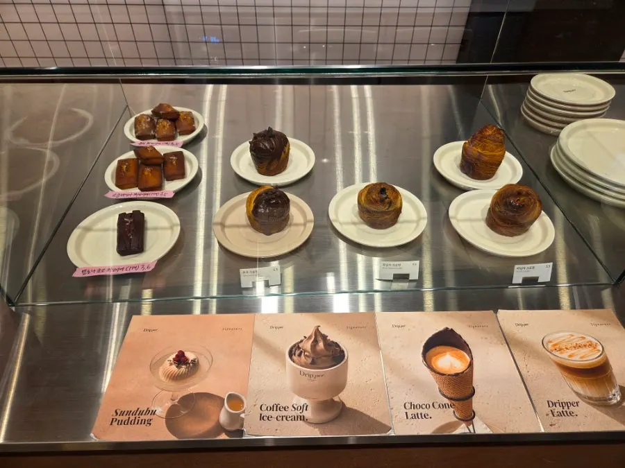 Menu board listing the signature items