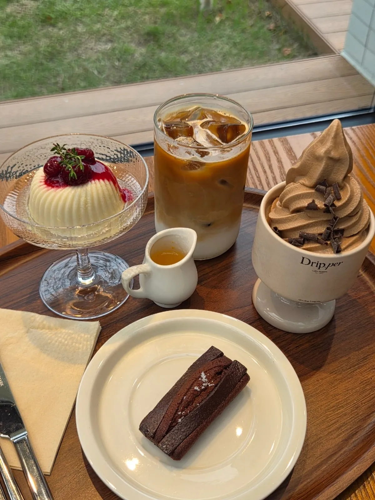 Coffee and desserts laid out on the table at Coffee Dripper