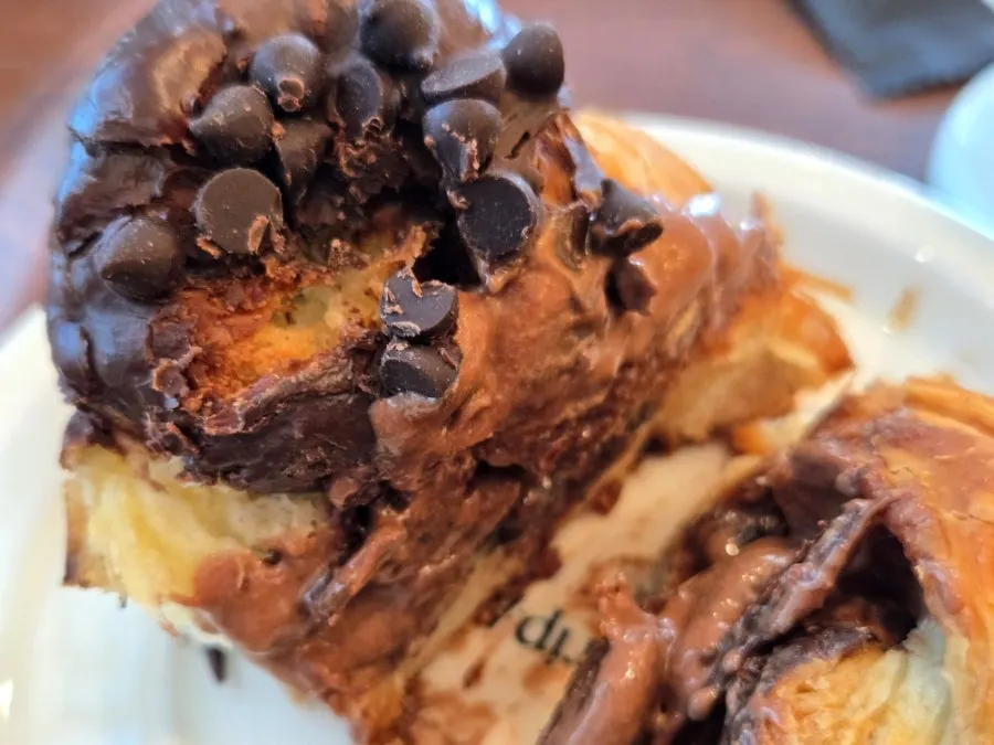 Eating the choco croffin together with the ice cream