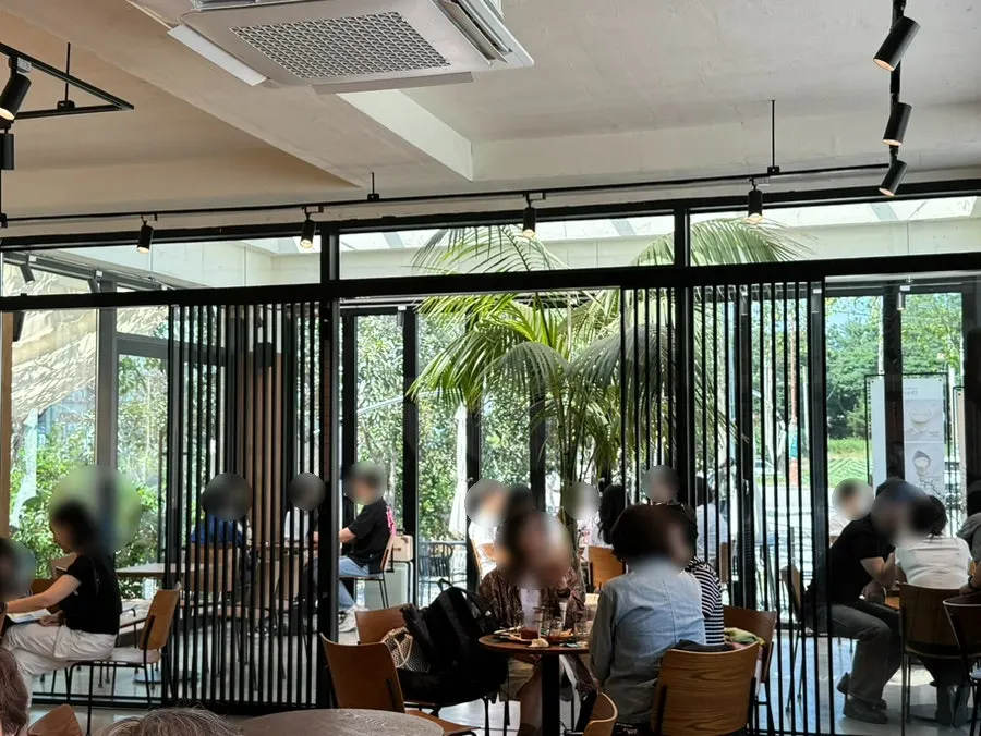Café interior decorated with plants