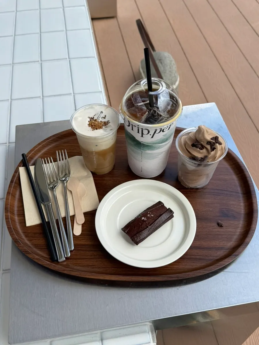 Drinking a Dripper Latte on the outdoor terrace