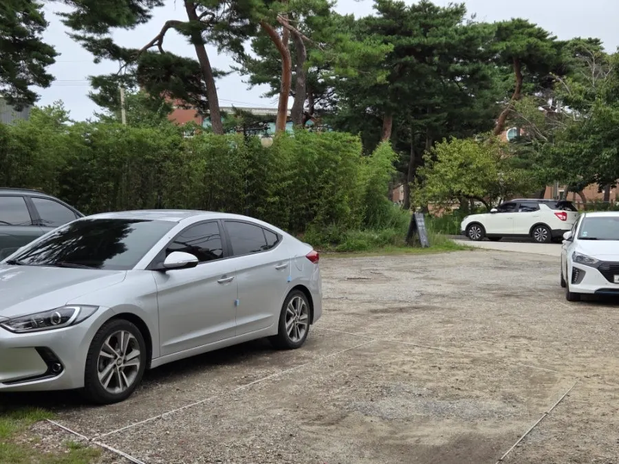 Spacious parking area at Cafe Giwa