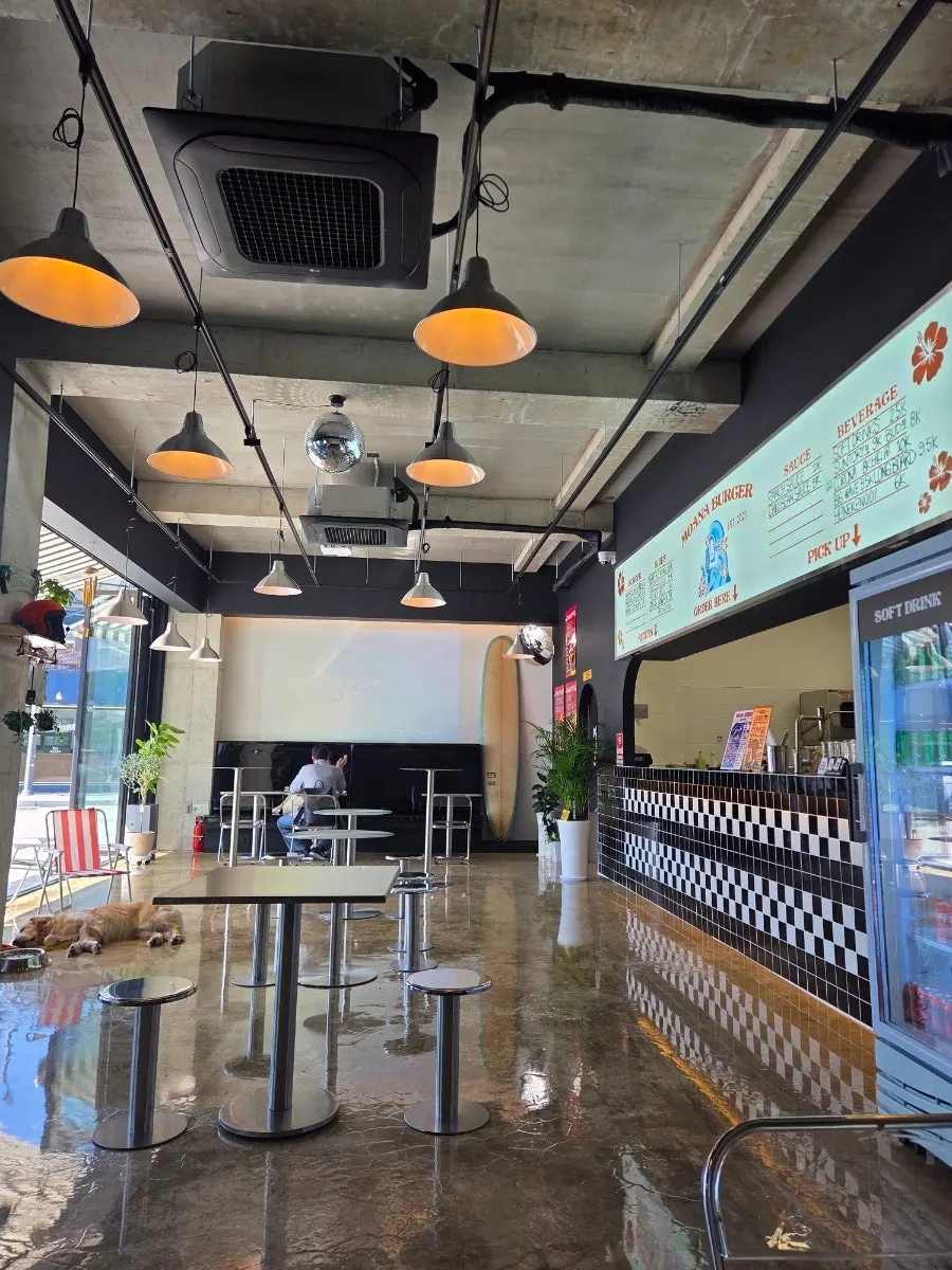 Moana Burger red signboard and exterior view