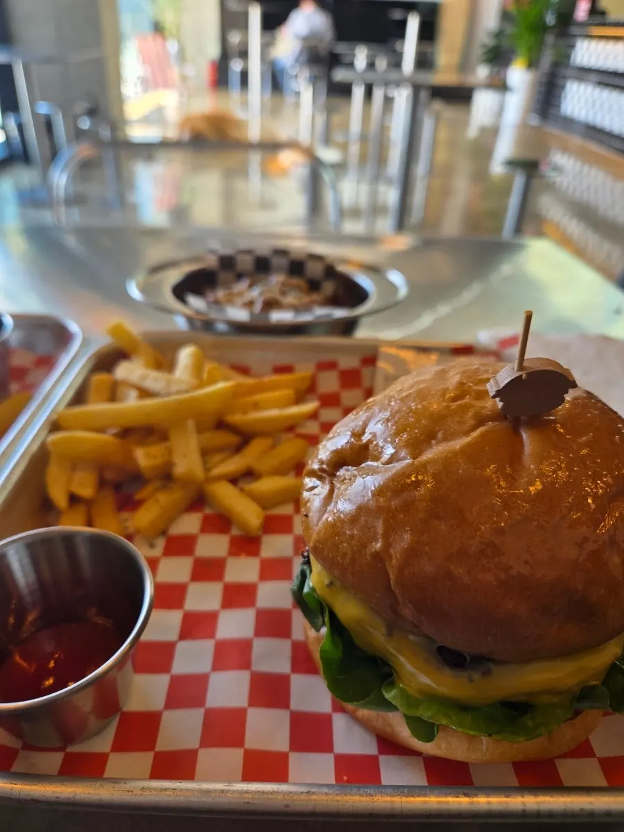 Moana Double Burger with a bite taken out